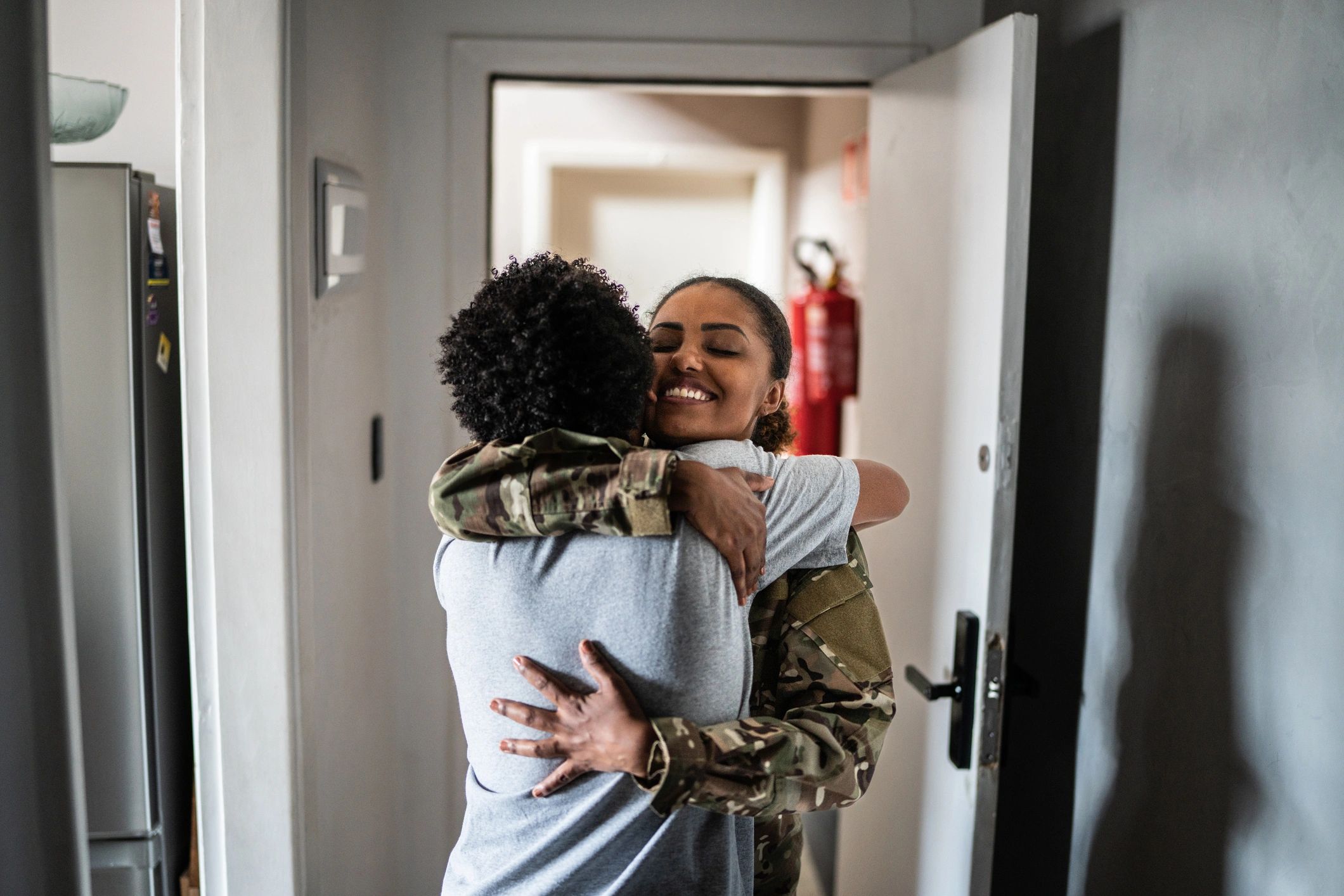 Military family welcoming a service member home